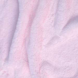 May include: Close-up of a soft, light pink faux fur fabric. The plush material has a textured appearance with subtle variations in color, creating a gentle, flowing effect. The fabric is ideal for blankets, throws, or other cozy items.