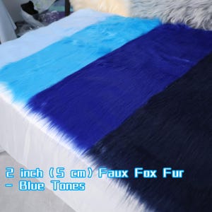 Blue faux fox fur fabric with a 2 inch pile height made from soft synthetic fiber. Perfect for fursuit making, plush toy details, cosplay accessories, or costume enhancements. This 20 × 50 cm fabric cut is great for small crafts and adds color and realism to your designs. It mimics natural fur beautifully while staying lightweight, cruelty-free, and easy to sew for DIY creators and furry fans.