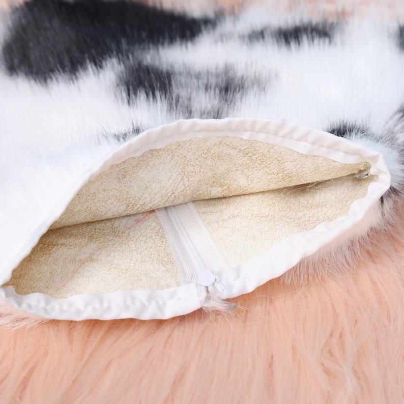Handmade cow pattern faux fur neck piece featuring spotted black and white patches arranged in organic shapes. This accessory’s soft texture and breathable inner lining make it a comfortable and stylish choice for furries, cosplayers, and costume makers who appreciate animal-inspired aesthetics and want to enhance their look.