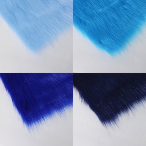 Soft synthetic blue faux fur fabric with long 2 inch pile. Ideal for use in fantasy costumes, cosplay ears, fursuit trims, or toy crafting. Its bright color and fox-like texture bring life to characters and plush creations. Sized at 20 × 50 cm, it's perfect for detail work, small crafts, or adding colorful fur panels to your next DIY furry or anime costume.