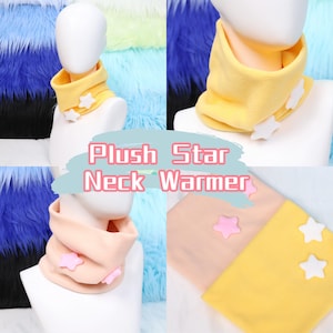 May include: A selection of plush neck warmers in yellow and peach, each decorated with star-shaped details. The image includes the text "Plush Star Neck Warmer". The neck warmers are displayed on a mannequin.