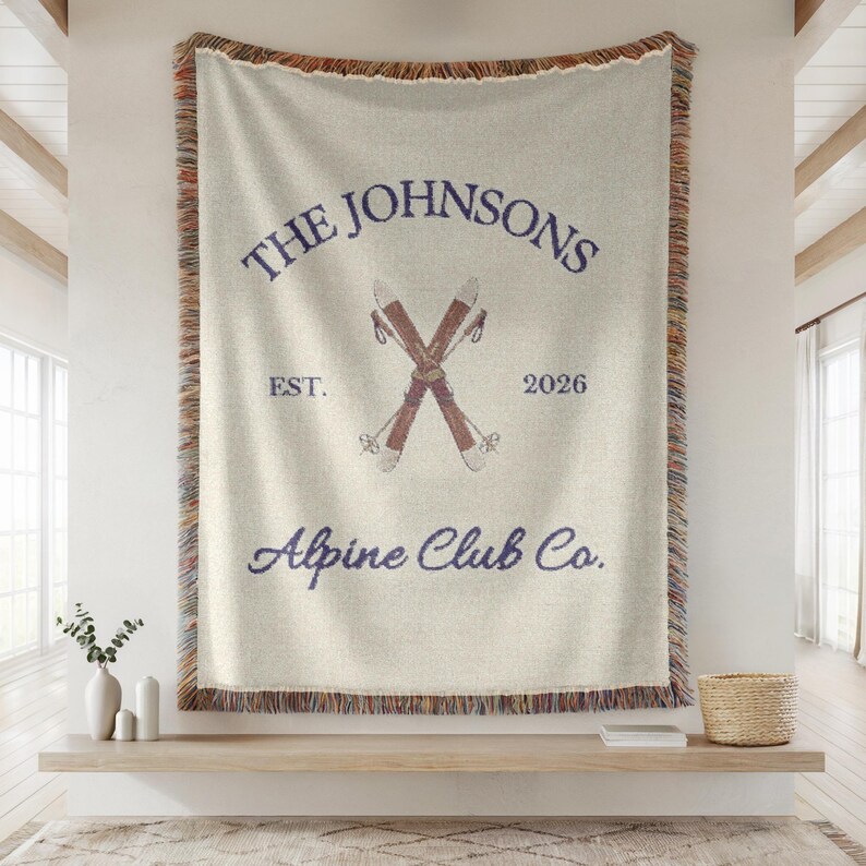 Personalized alpine blanket with family name and establishment year woven into cotton throw design, alpine ski club design in cream , beautiful wall decor and home textile