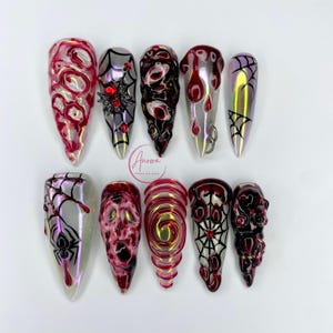 Uñas postizas de Halloween con forma de araña y globo ocular en 3D: Horror sangriento