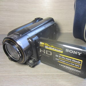 Vintage Sony Handycam HDR-XR520E caméscope numérique HD caméscope 240 Go PAL testé fonctionnel