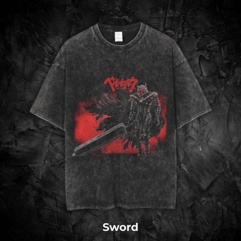 May include: Dark gray t-shirt with a distressed look, featuring a red and black graphic of a warrior holding a large sword. Japanese text is above the graphic. The word "Sword" is printed at the bottom.