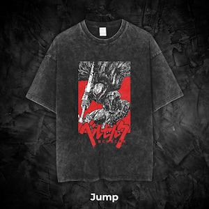 May include: Dark gray t-shirt featuring a red rectangle with a black and white illustration of a warrior holding a large sword. The word "BERSERK" is printed in red below the illustration. The word "Jump" is printed at the bottom.