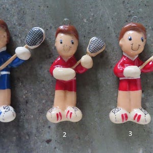 lacrosse ornament handmade from bread dough by judy caron (male)