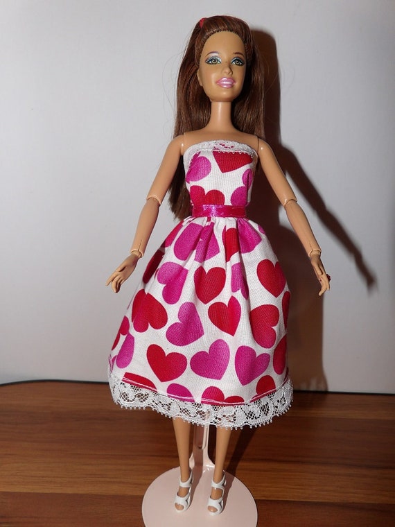 barbie with white dress and red hearts 1966 Barbie Doll Valentine Hearts Dress Red White Vintage
