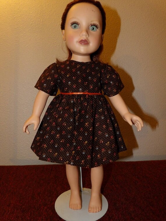 brown dress with white dots