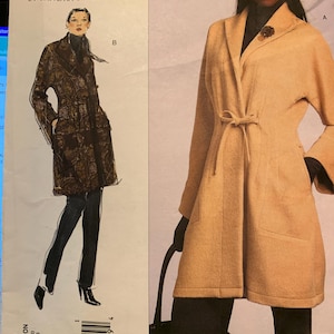 May include: A Vogue Patterns sewing pattern, V1060, featuring a woman in a tan coat with a tie waist and a woman in a brown patterned coat. The pattern includes the text "TODAY'S FIT" and "VOGUE PATTERNS".