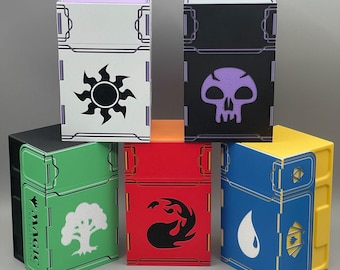 May include: A set of laser-cut card storage boxes in various colours. Each box displays a unique symbol and colour scheme, including white with a sun, black with a skull, green with a tree, red with flames, and blue with a water drop. Designed for card games.