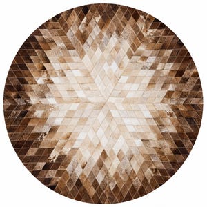 May include: A circular rug constructed from individual diamond-shaped pieces of cowhide leather. The pattern features a gradient of brown, tan, and cream tones arranged in a geometric starburst design that radiates from the center outward.