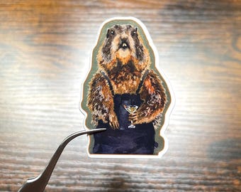 Marmot drinking a cocktail vinyl sticker.