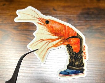 Northern Shrimp in a boot and overalls vinyl sticker.