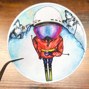 Skier .5 atop Alyeska mountain / vinyl sticker