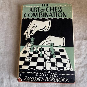 May include: Vintage book titled "The Art of Chess Combination" with a cover illustration of a chessboard and chess pieces. The cover features the author's name, Eugene Znosko-Borovsky, and a black and white design with green accents.