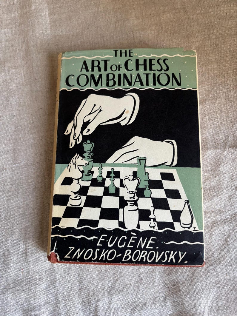 May include: Vintage book titled "The Art of Chess Combination" with a cover illustration of a chessboard and chess pieces. The cover features the author's name, Eugene Znosko-Borovsky, and a black and white design with green accents.
