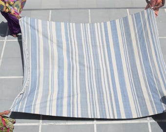 Alfombra Dhurrie de lana tejida a mano, borde floral azul, tejido plano reversible