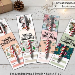 May include: Four Christmas-themed pen holders with decorative designs and the words "Merry Christmas." Each holder features a different festive illustration and a red and white striped pen. The text "Instant Download & Print" is also visible.