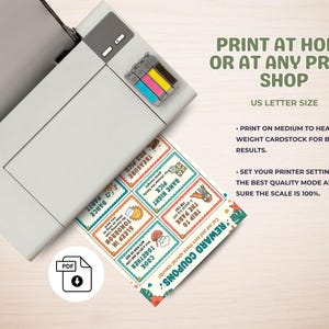 May include: A printer printing a sheet of reward coupons. The coupons have colorful illustrations and text such as "Trip to the Park" and "Cook Together". The text on the image says "Print at Home or at Any Print Shop".