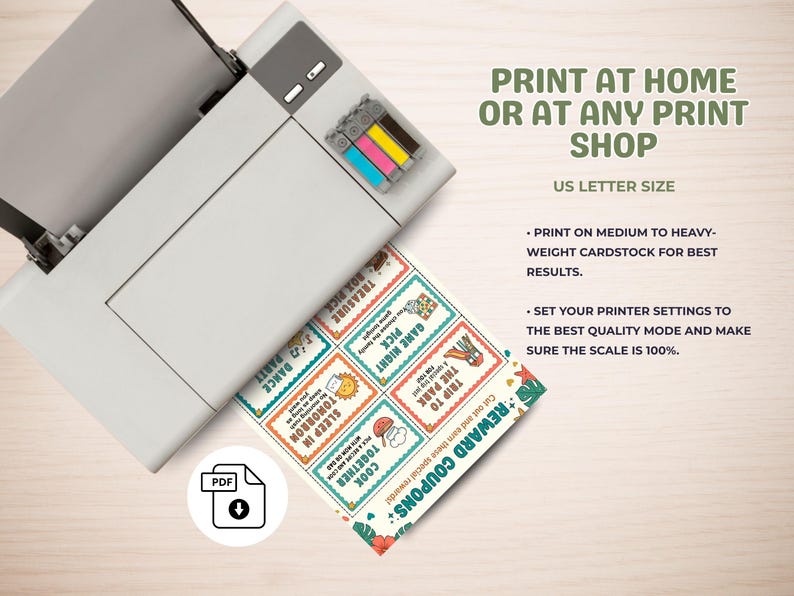 May include: A printer printing a sheet of reward coupons. The coupons have colorful illustrations and text such as "Trip to the Park" and "Cook Together". The text on the image says "Print at Home or at Any Print Shop".