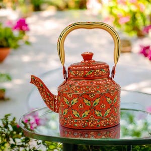 May include: A set of three ceramic mugs with a speckled, matte finish. The mugs are in shades of cream, light gray, and dark gray. Each mug has a simple, minimalist design, perfect for coffee or tea.