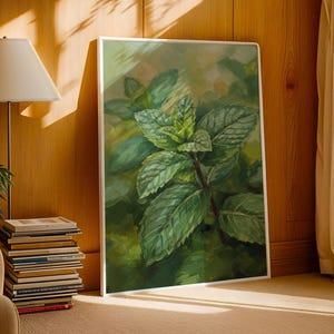 May include: A vertical rectangular framed wall art piece featuring a detailed painting of a vibrant green mint plant with textured leaves and dark stems. The artwork is enclosed in a simple white frame, showcasing botanical art with deep green tones.