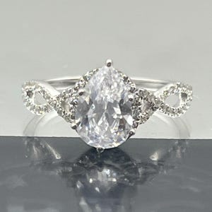 Sterling Silver Pear-Cut CZ Ring – 2.085 ct Center with 53 Round CZ Halo