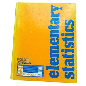 May include: A textbook titled Elementary Statistics by Robert Johnson, 3rd edition. The cover is bright yellow with bold blue vertical text. The author name is printed in black, and the edition information is displayed in a blue rectangular box.