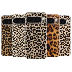 May include: Five phone cases with leopard print designs. The cases feature a variety of patterns, including spots in shades of brown and black on a tan background. The cases are made of a clear material.