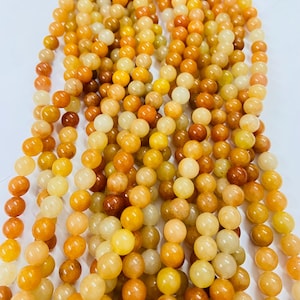 Yellow Rhodonite Gemstone Beads: Smooth Polished Round, 15&quot; Strand