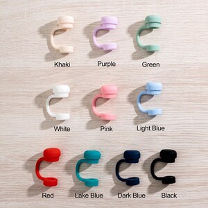 May include: A collection of nine colorful silicone straw tips in various shades, including khaki, purple, green, white, pink, light blue, red, lake blue, dark blue, and black. Each tip is labeled with its corresponding color name.