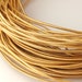 LRD0105042) 0.5mm Gold Genuine Metallic Round Leather Cord. 0.8 meter, 1.5 meters, 4.1 meters. Length Available.