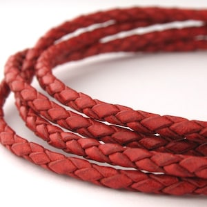 LBOLO0325652) 2.5mm Antique Rust Genuine Braided Bolo Leather Cord.  3.34 meters, 5.3 meters.  Length Available.