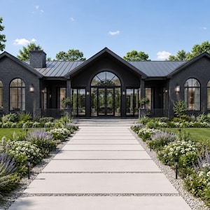 Peut inclure: Une maison de plain-pied avec des murs extérieurs en briques gris anthracite, un toit en métal et une entrée centrale voûtée. L'avant présente une large allée en béton bordée de pelouses vertes et de parterres de fleurs blanches et violettes.