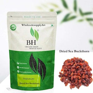 Puede incluir: Un paquete de semillas de "Espino Amarillo Seco" de WholesalesupplyArt. La bolsa es blanca y verde, con el texto "BH Organic Seeds High Quality". La imagen también muestra un montón de bayas de espino amarillo secas, de color marrón rojizo.