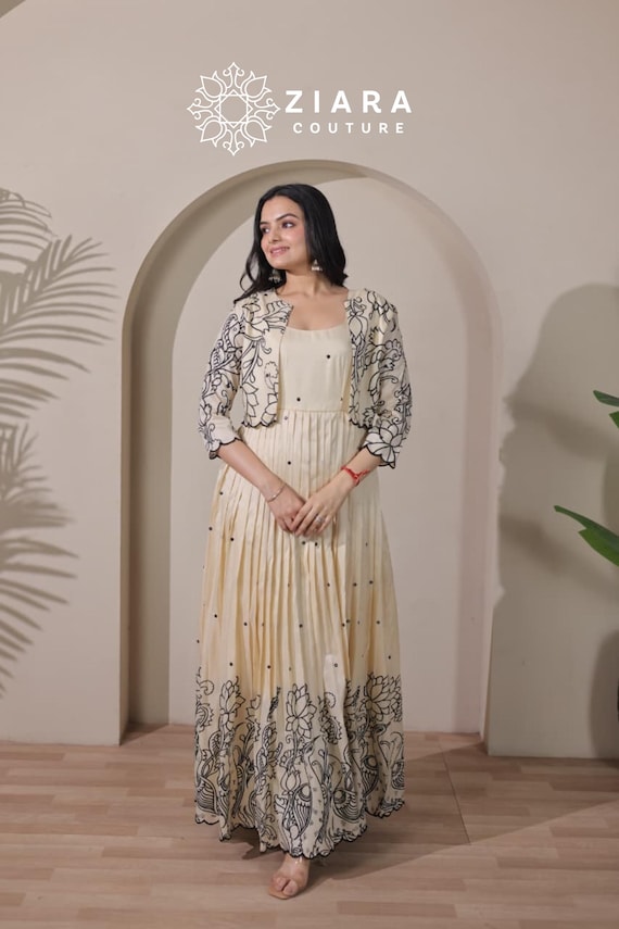kalamkari maxi dress Spring Summer 2026. Muse- @sreenandashankar Mustard & Olive-Green Kalamkari  and jamdani booti weave combined maxi dress detailed with origami pleats  and metal zipper. Available in Blue & Rust combination as well. Inbox