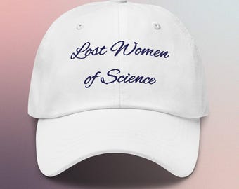 Lost Women of Science cap in cursive, available in white, pink, or blue