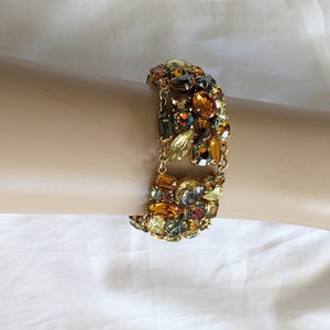 Rare LANVIN Articulated Bracelet Golden Ribbon Embellished with Orange, Blue-Grey And Bronze Stones Vintage Jewelry