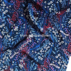 Rayon fabric, floral and shoots on dark blue background print, very soft and drape well, half yard by 56&quot; wide