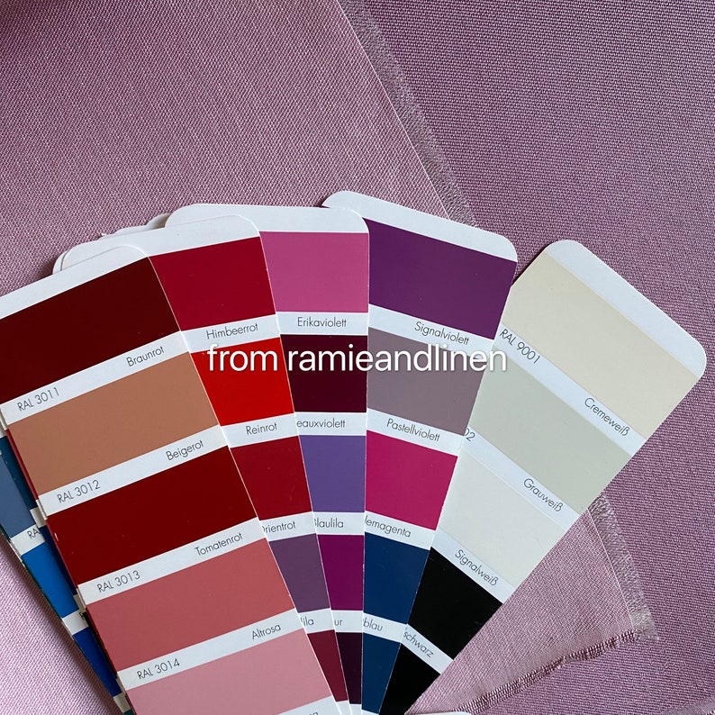 May include: A fan-shaped color chart with 12 different shades of red, purple, and beige. The color chart is labeled with the RAL color codes and German names for each color.