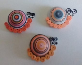 Gequilleerde papieren slakmagneten: uniek koelkastdecor