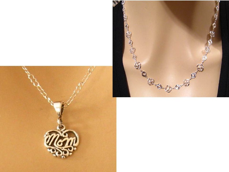 May include: Two silver necklaces. One necklace features a heart-shaped pendant with the word "Mom" in a cursive script. The other necklace is a chain with small, open circle links.