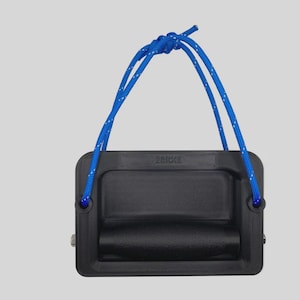 May include: A black handle with a blue and white rope attached. The handle is rectangular with a rounded grip and the text "2018KE" is visible. The rope is tied at the top.