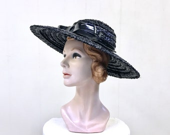 Vintage 1960s Black Wide Brimmed Straw Hat, 60s Ebony Cello Sun Hat, Cartwheel Hat with Patent Leather Bow, Plaza Suite by Betmar, VFG