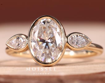 Oval Bezel Engagement Ring with Pear Side Stones, Three Stone Gold Ring, Unique Oval Cut Moissanite Ring, Modern Bridal Ring