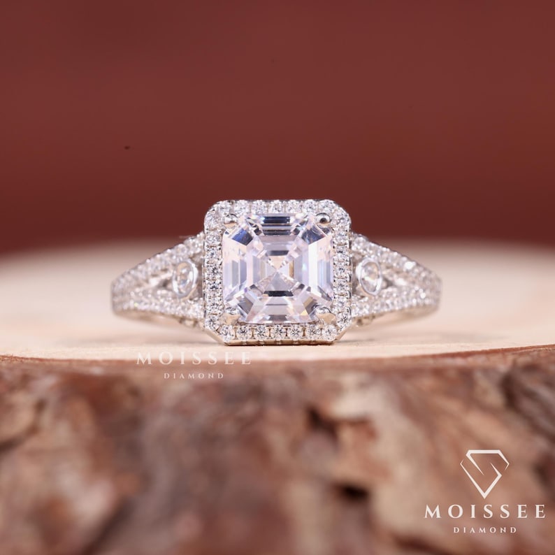 Three Stone 2CT Asscher Cut Moissanite Engagement Ring with elegant side stones, perfect bridal wedding and anniversary gift for her.