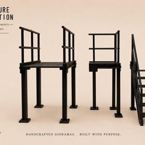 May include: Three black miniature industrial structures featuring elevated platforms, railings, and a staircase. The text "FIGURE FICTION MINIATURE ENVIRONMENTS DIORAMA WORKS" and "HANDCRAFTED DIORAMAS. BUILT WITH PURPOSE." is visible in the upper left and bottom.