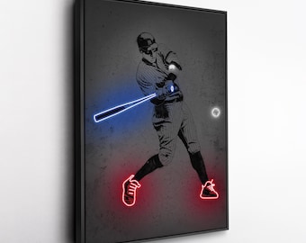 May include: A framed artwork featuring a baseball player in a batting stance. The player and background are grayscale, with neon blue outlining the bat and neon red outlining the shoes. A white baseball is also visible.