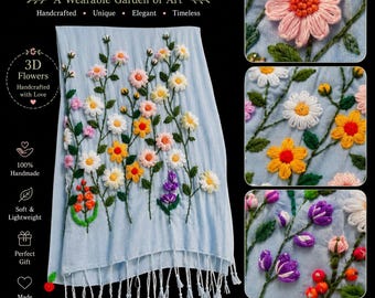 May include: A light blue shawl featuring hand-embroidered 3D flowers in pink, yellow, white, orange, and purple with green stems and leaves. The shawl has a fringed hem and includes text such as Hand Embroidered Floral Shawl and 3D Flowers.